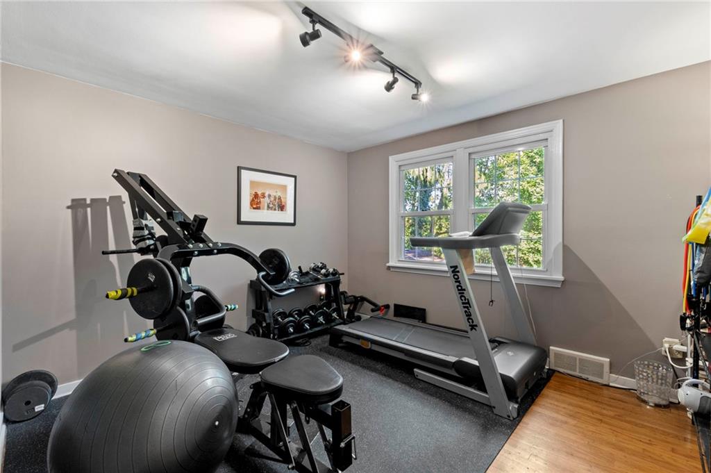 21 Oakglen Drive Oakmont, PA 15139 - Photo 29 of 50 a room with gym equipment and a large window