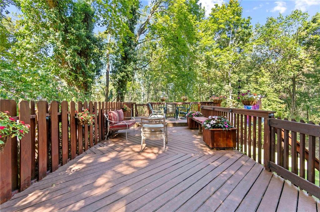 21 Oakglen Drive Oakmont, PA 15139 - Photo 39 of 50 a view of a deck with wooden floor and barbeque oven
