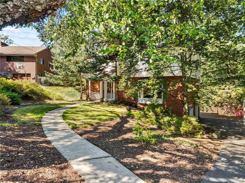 21 Oakglen Drive Oakmont, PA 15139 - Photo 50 of 50 a front view of a house with a yard
