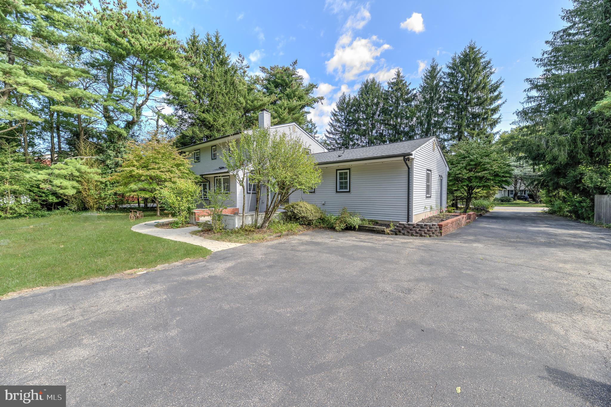 90 Princeton Hightstown Road Princeton Junction, NJ 08550 - Photo 20 of 20 a view of a house with backyard and garden