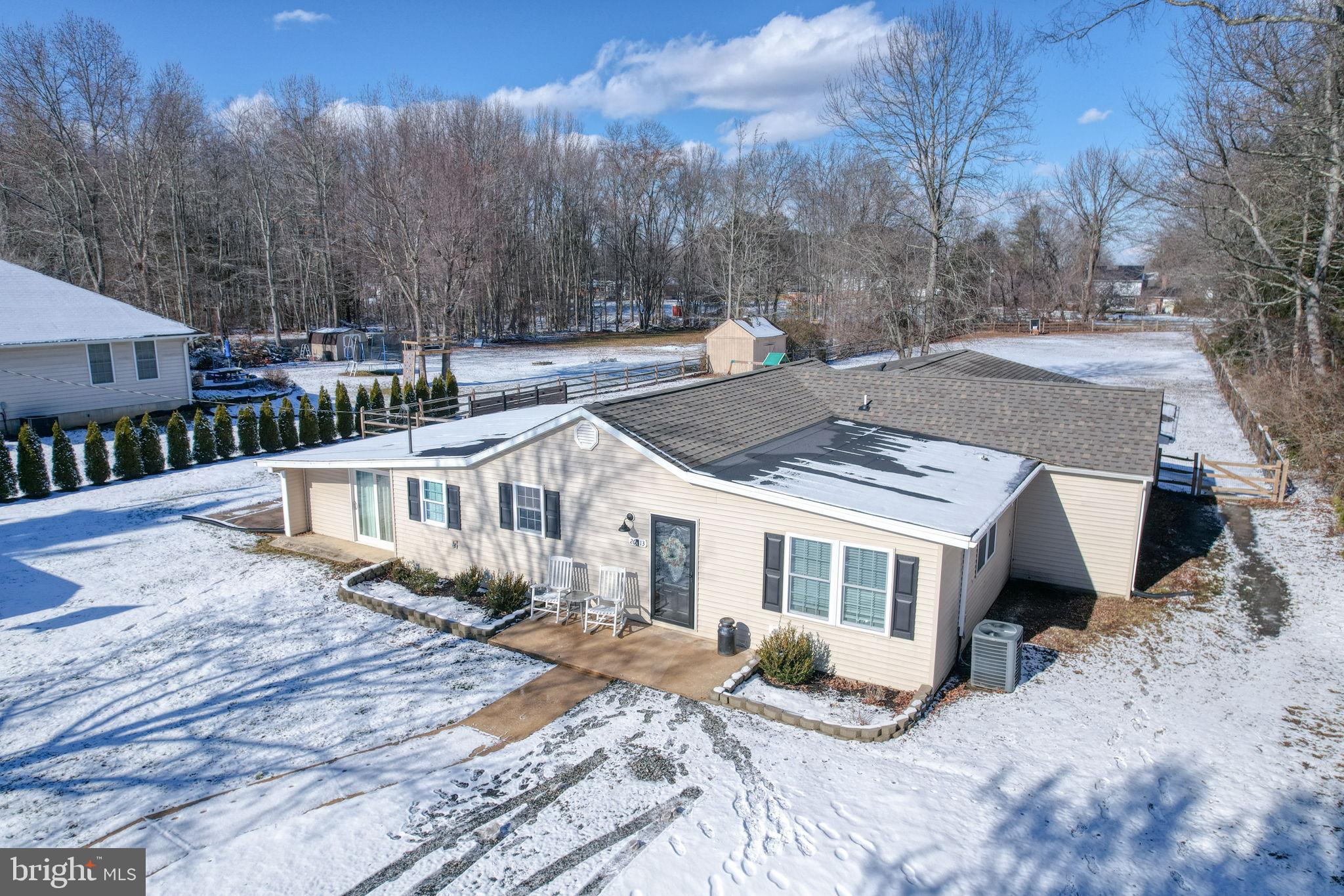 2613 Old County Road Newark, DE 19702 - Photo 3 of 50 Charming home nestled in a snowy landscape.