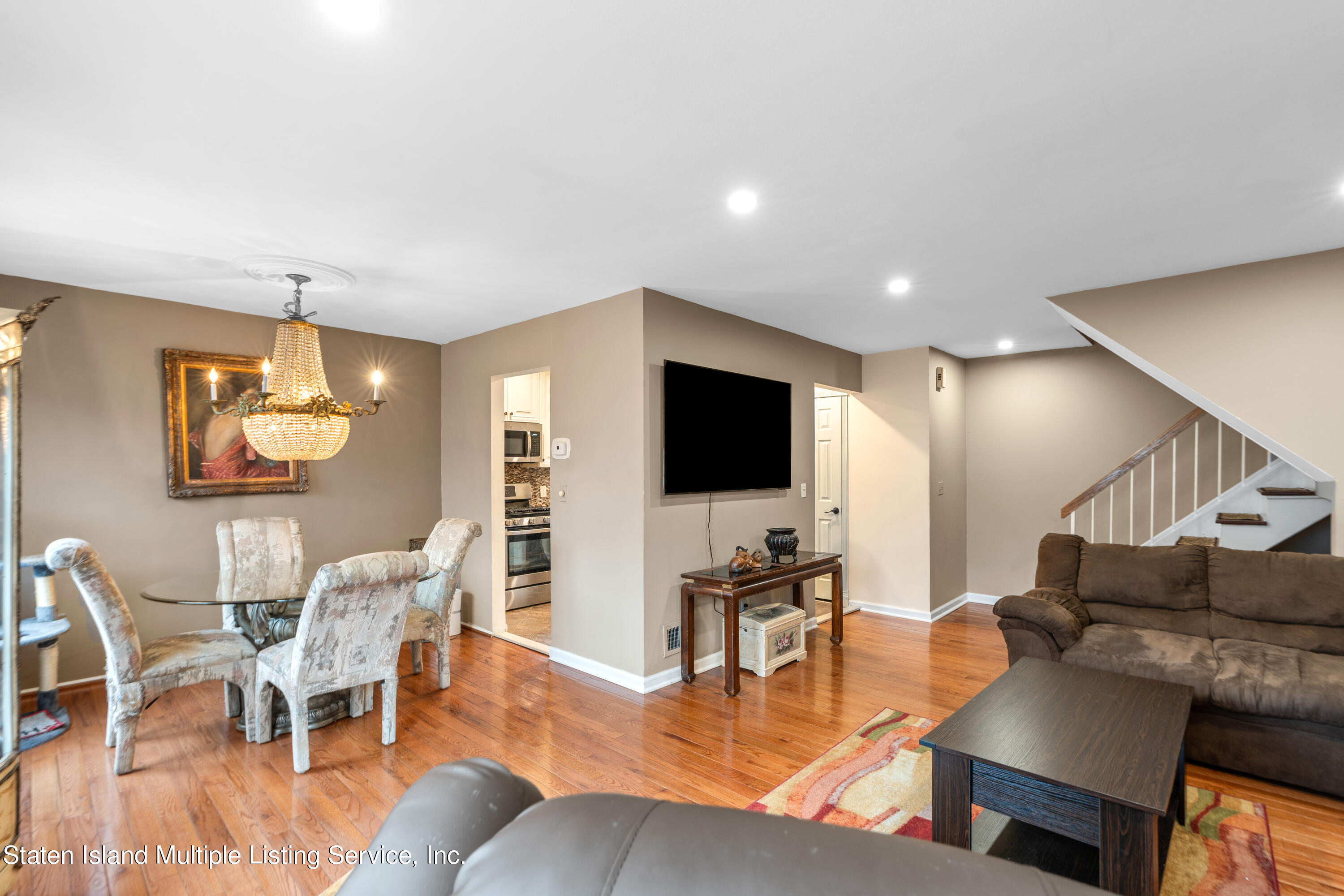 15 Flagship Circle Staten Island, NY 10309 - Photo 17 of 31 a living room with furniture and a flat screen tv