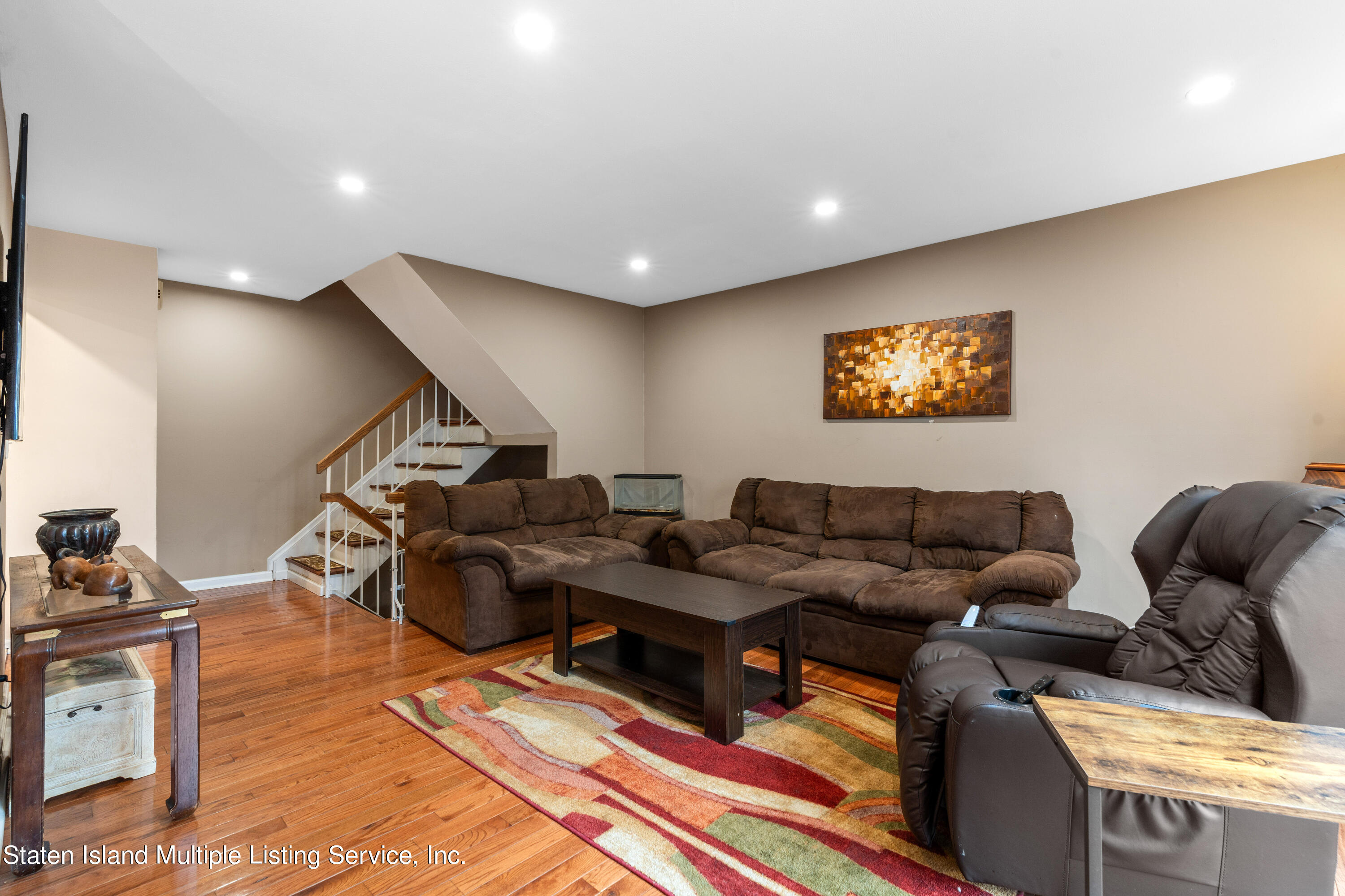 15 Flagship Circle Staten Island, NY 10309 - Photo 20 of 31 a living room with furniture and a flat screen tv