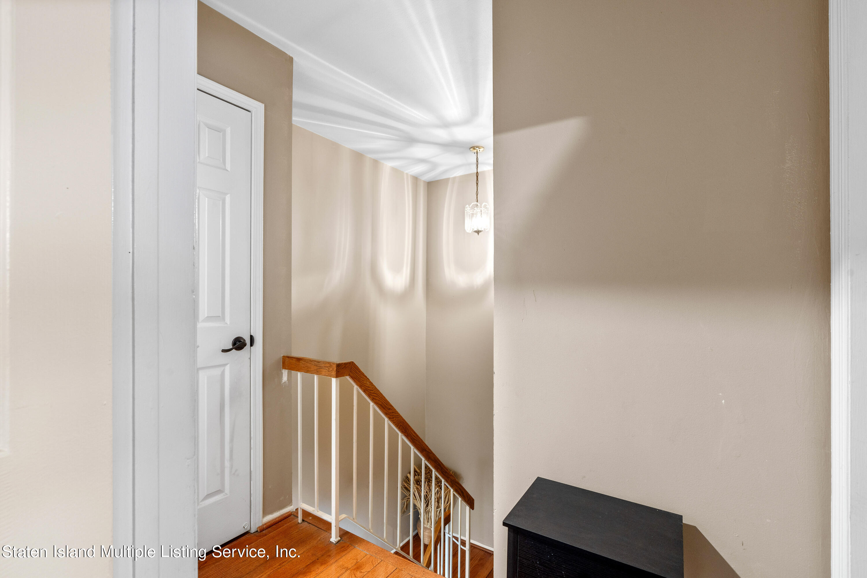 15 Flagship Circle Staten Island, NY 10309 - Photo 25 of 31 a view of a hallway with wooden floor and entryway