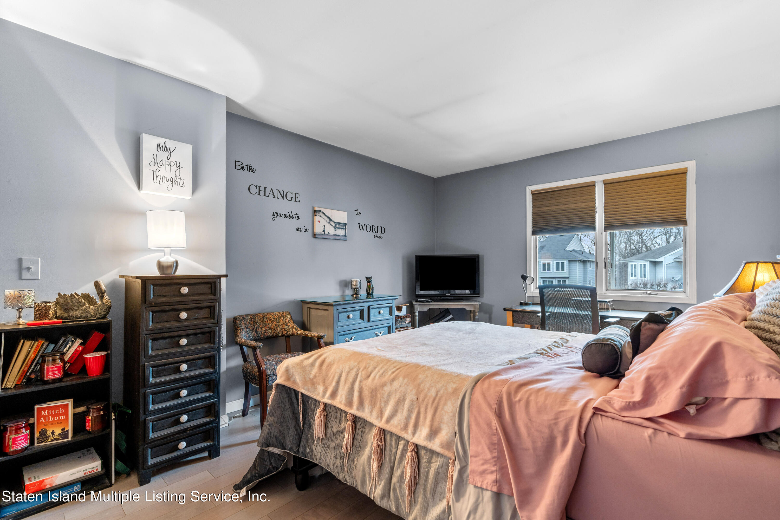 15 Flagship Circle Staten Island, NY 10309 - Photo 27 of 31 a bedroom with two beds and a bookshelf