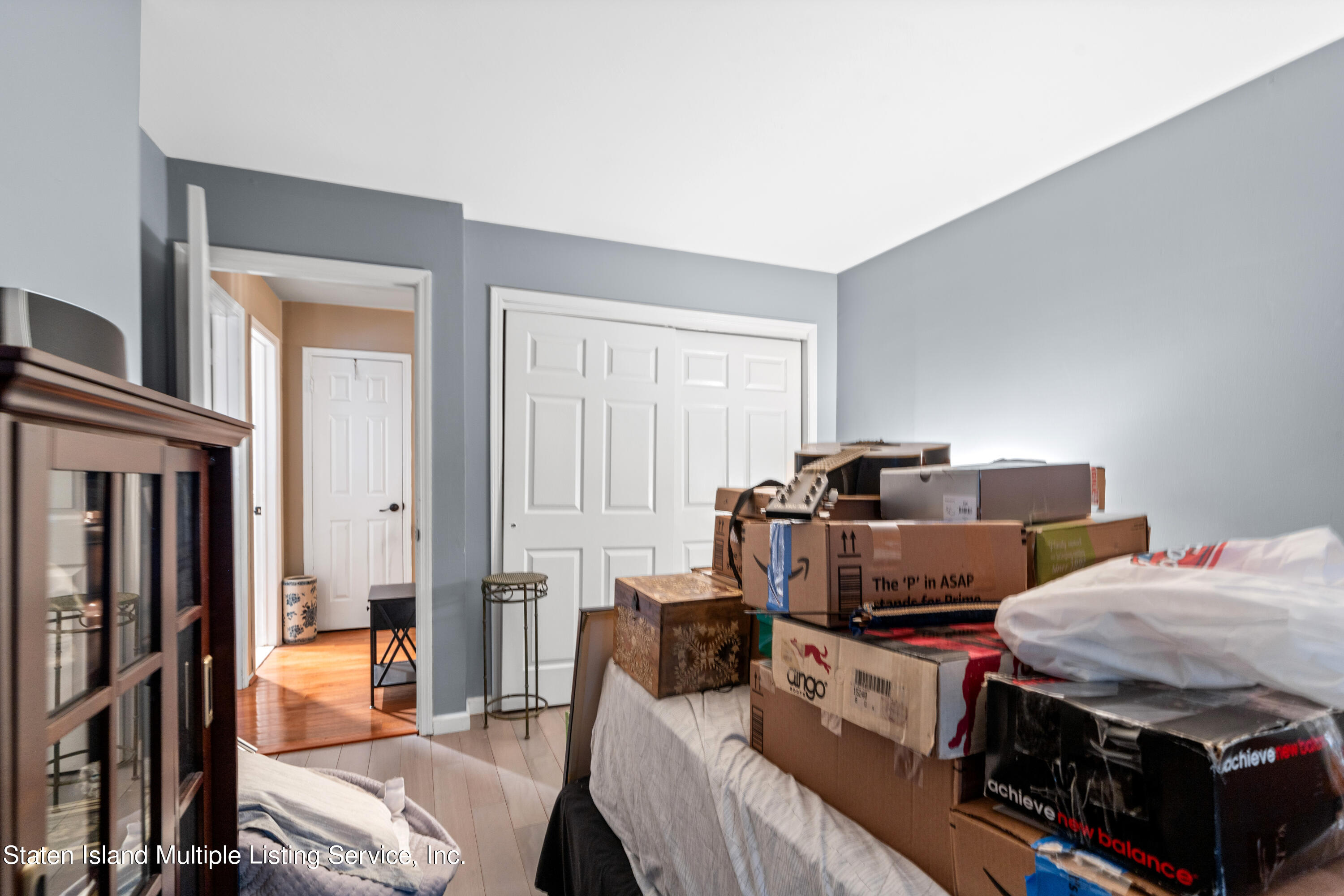 15 Flagship Circle Staten Island, NY 10309 - Photo 30 of 31 a bedroom with furniture and a closet