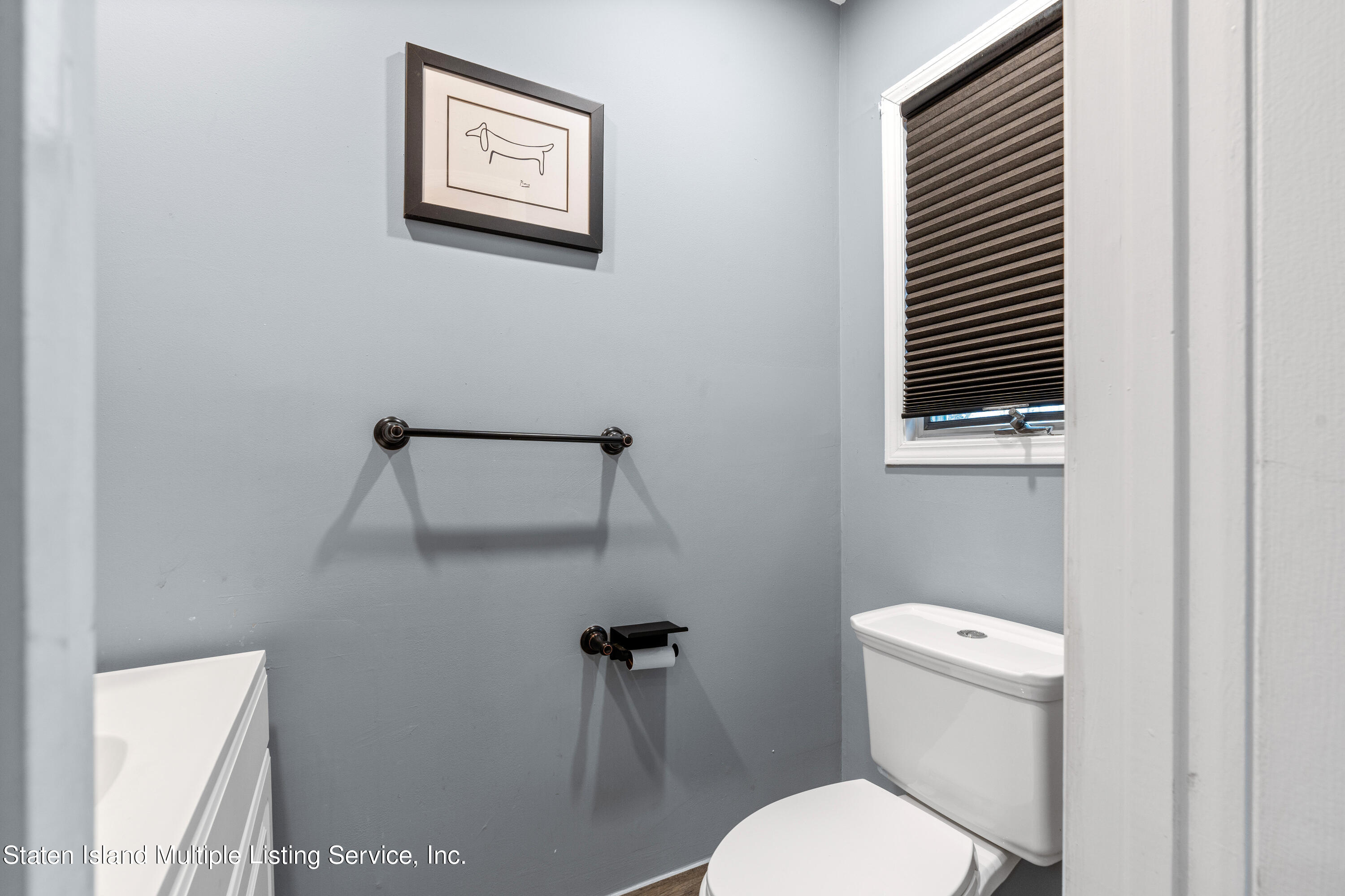 15 Flagship Circle Staten Island, NY 10309 - Photo 9 of 31 a white toilet sitting next to a shower