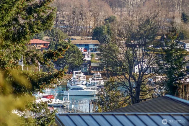 a view of a house with a yard and garden