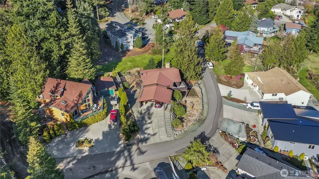 an aerial view of a houses with outdoor space