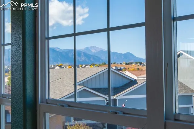 a view of a living room and kitchen
