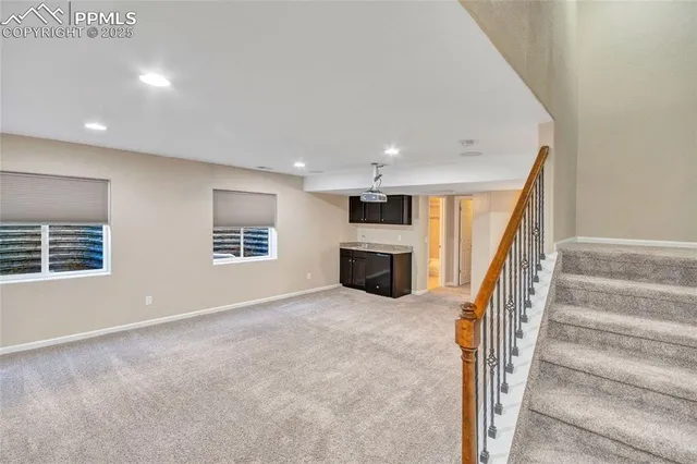 a bathroom with a granite countertop toilet sink and a bathtub