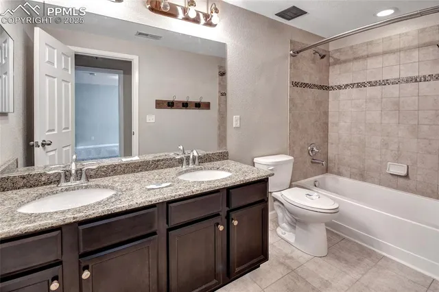 a view of a hallway with stairs