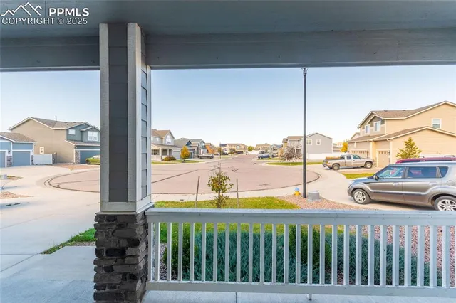 a view of a balcony with city view
