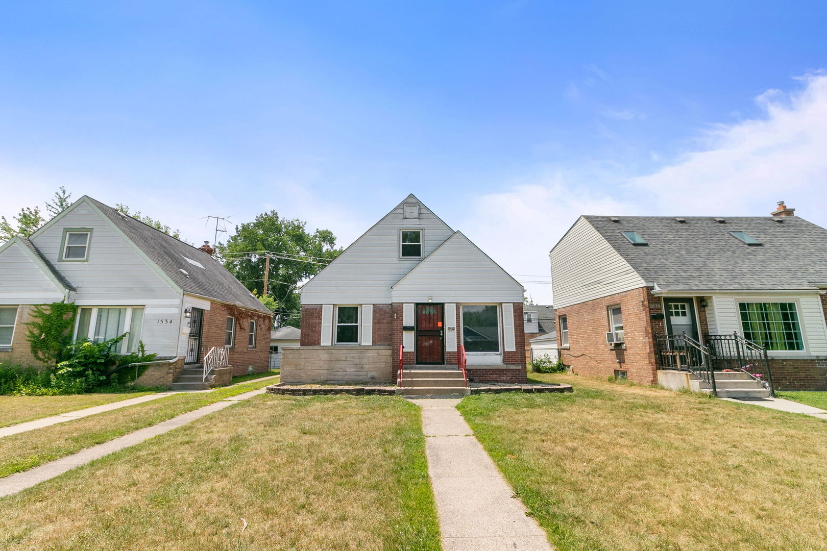 1532 State Line Road Calumet City, IL 60409 - Photo 1 of 15 a view of a house with swimming pool and a yard