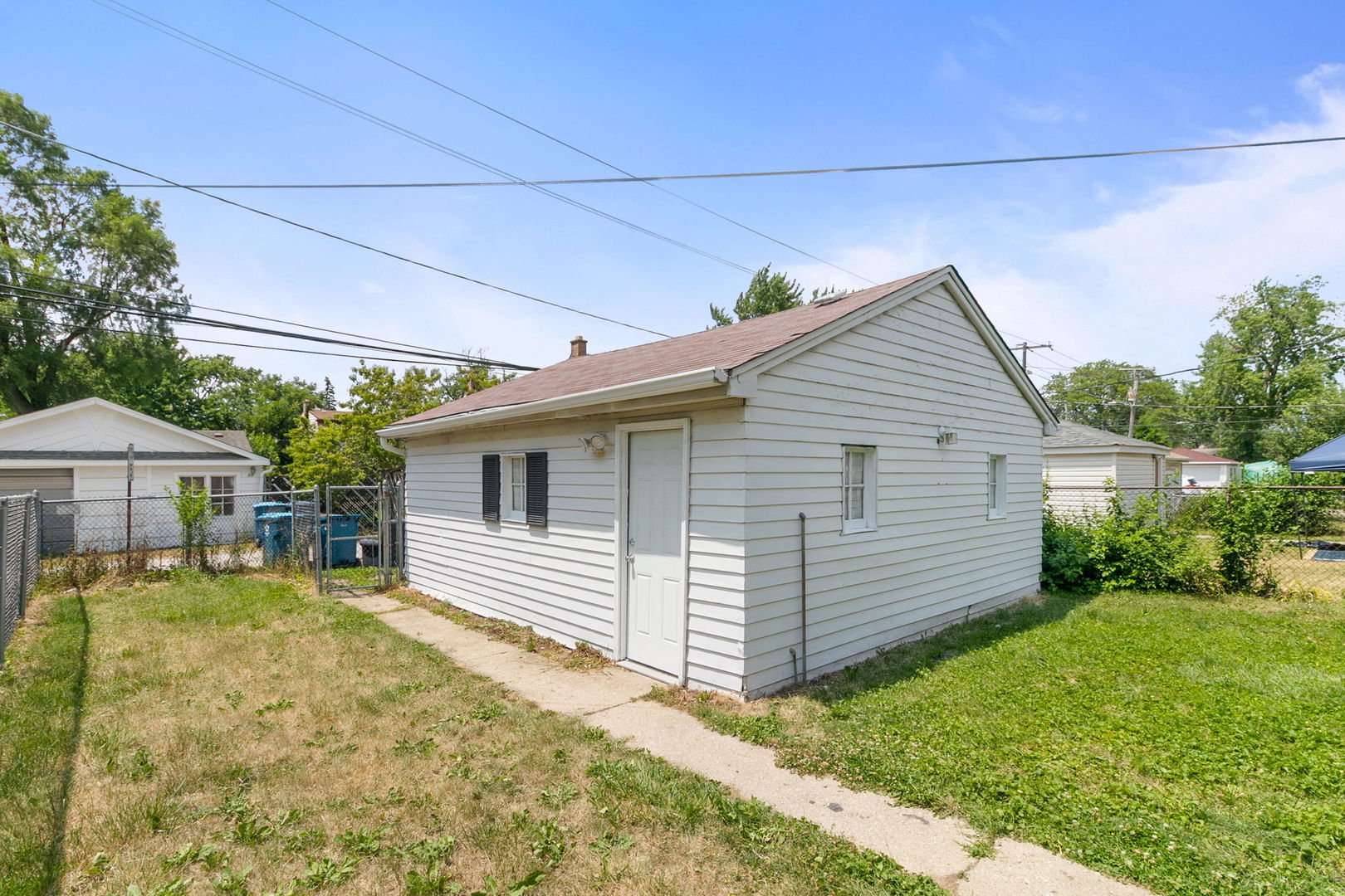 1532 State Line Road Calumet City, IL 60409 - Photo 14 of 15 a view of a house with a yard