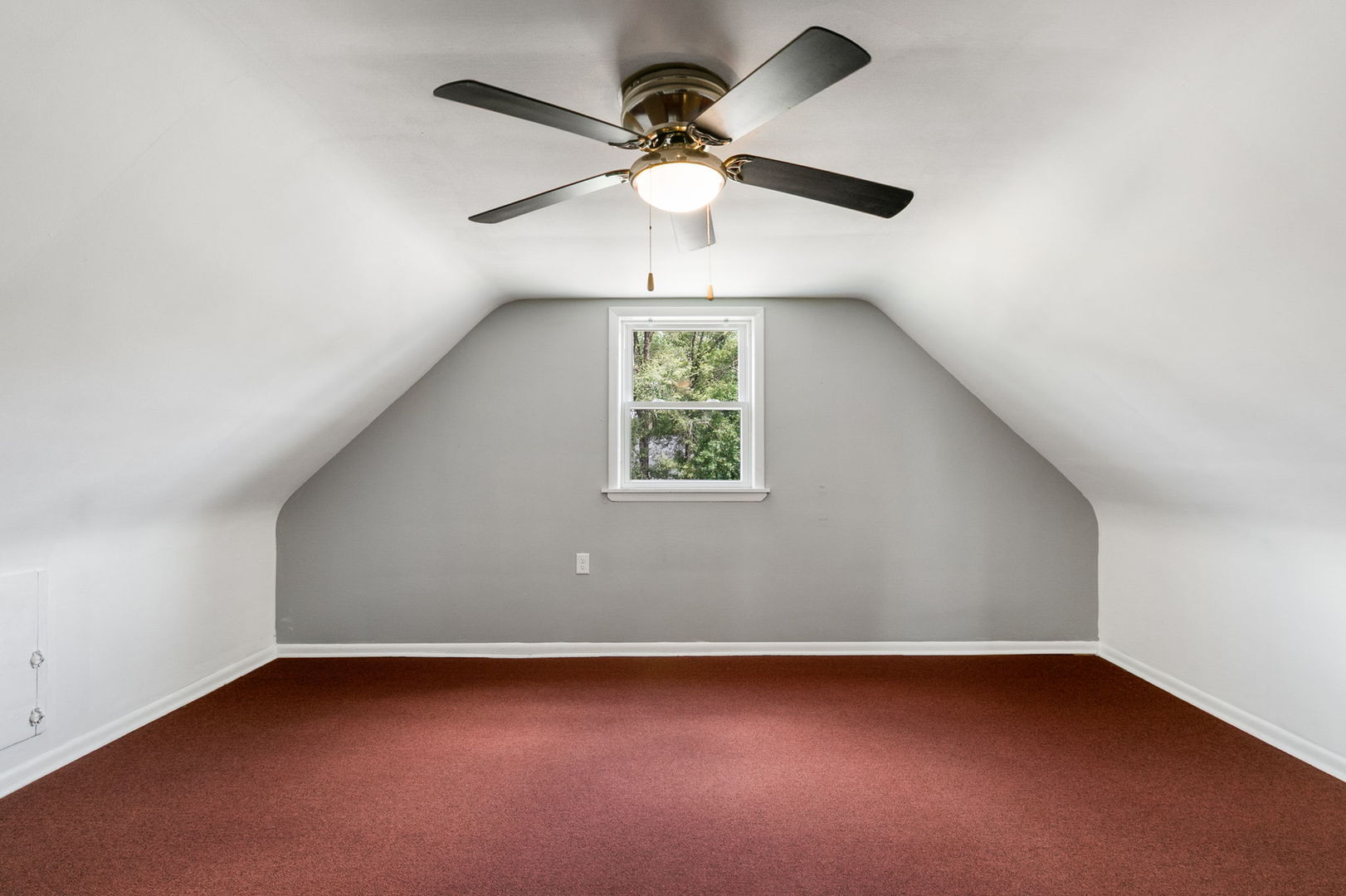 1532 State Line Road Calumet City, IL 60409 - Photo 10 of 15 an empty room with a window and a ceiling fan