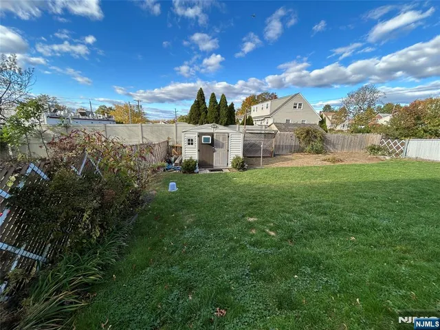 a view of a back yard of the house