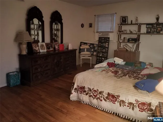 a bathroom with a sink mirror and toilet