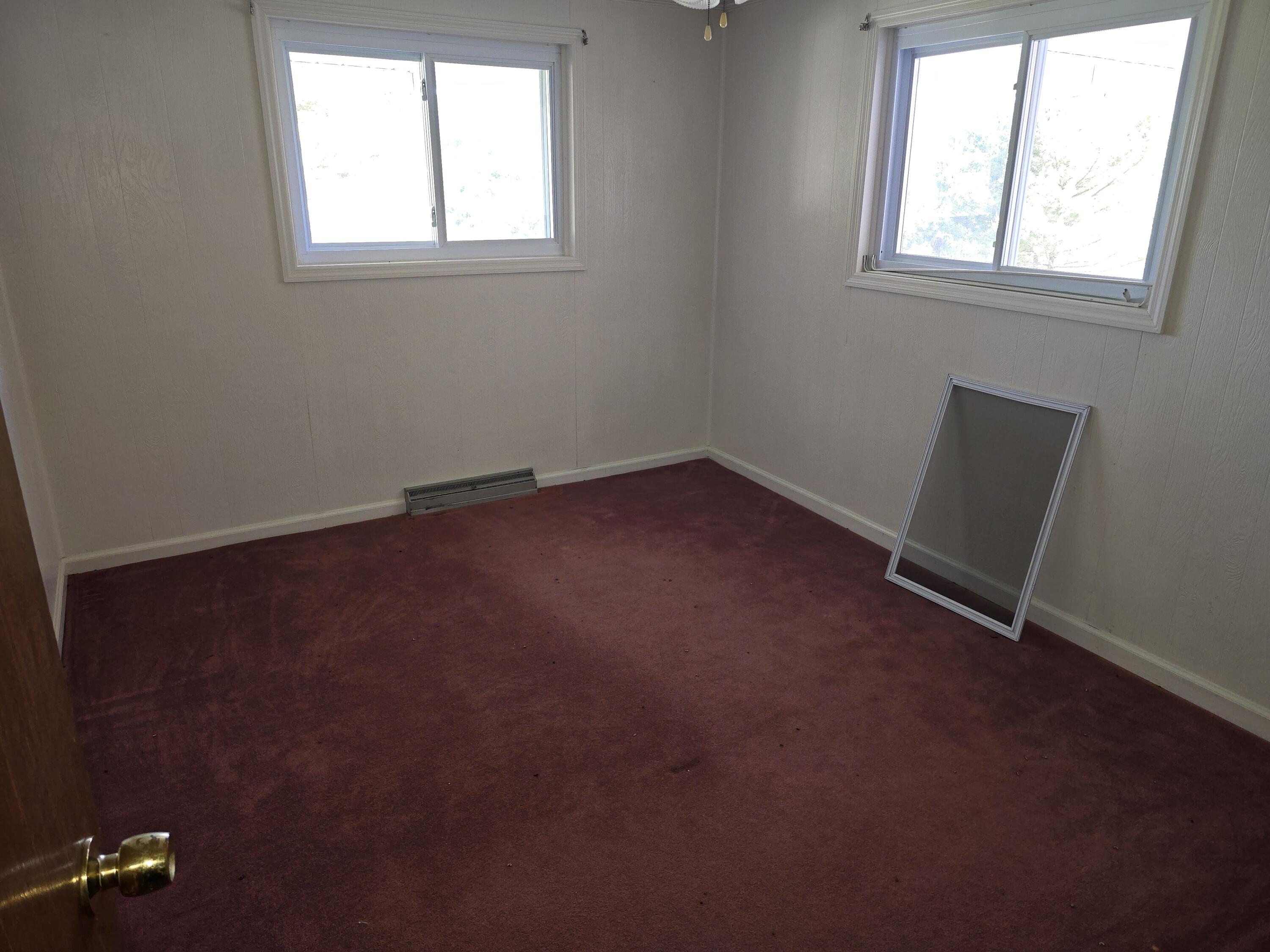 415 Stock Pen Mountain Road Narrows, VA 24124 - Photo 8 of 16 an empty room with a window