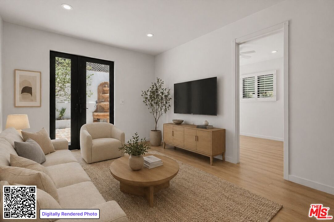 6732 Esplanade Street Playa del Rey, CA 90293 - Photo 2 of 10 a living room with furniture and a flat screen tv
