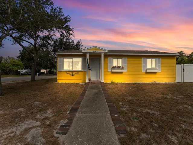 a front view of house with yard