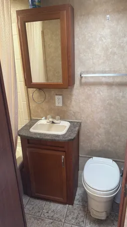 a bathroom with a sink and a toilet