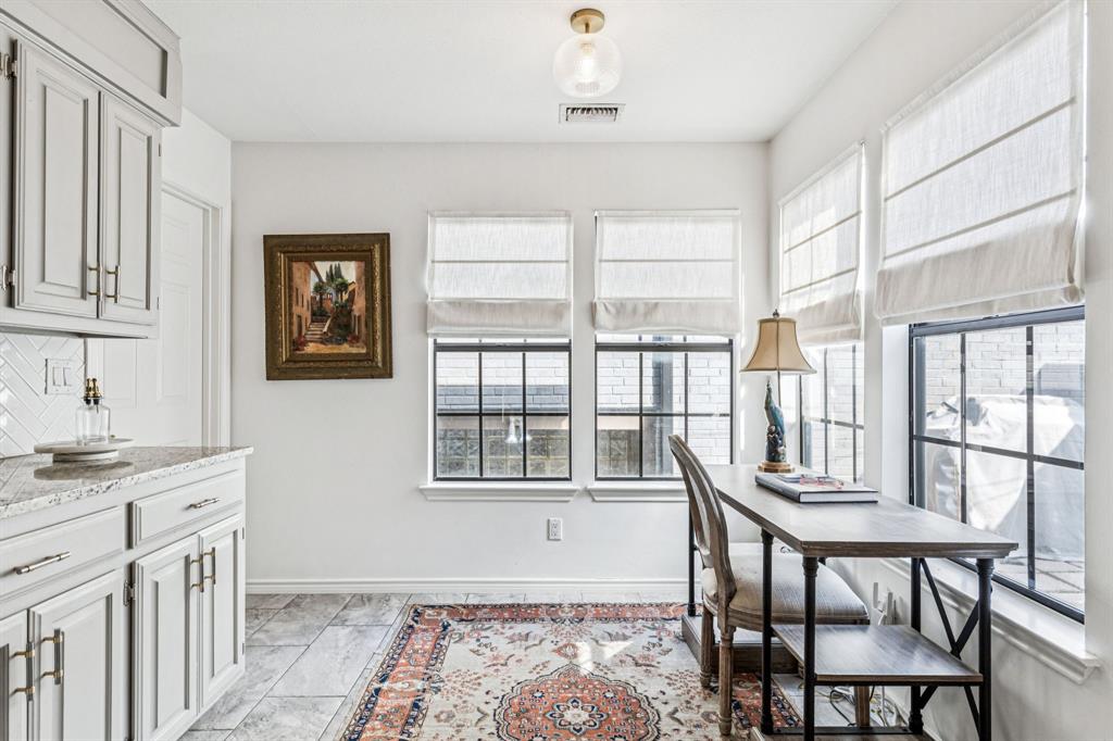 3635 Bryan Street Dallas, TX 75204 - Photo 18 of 40 a view of a dining room with furniture window and wooden floor