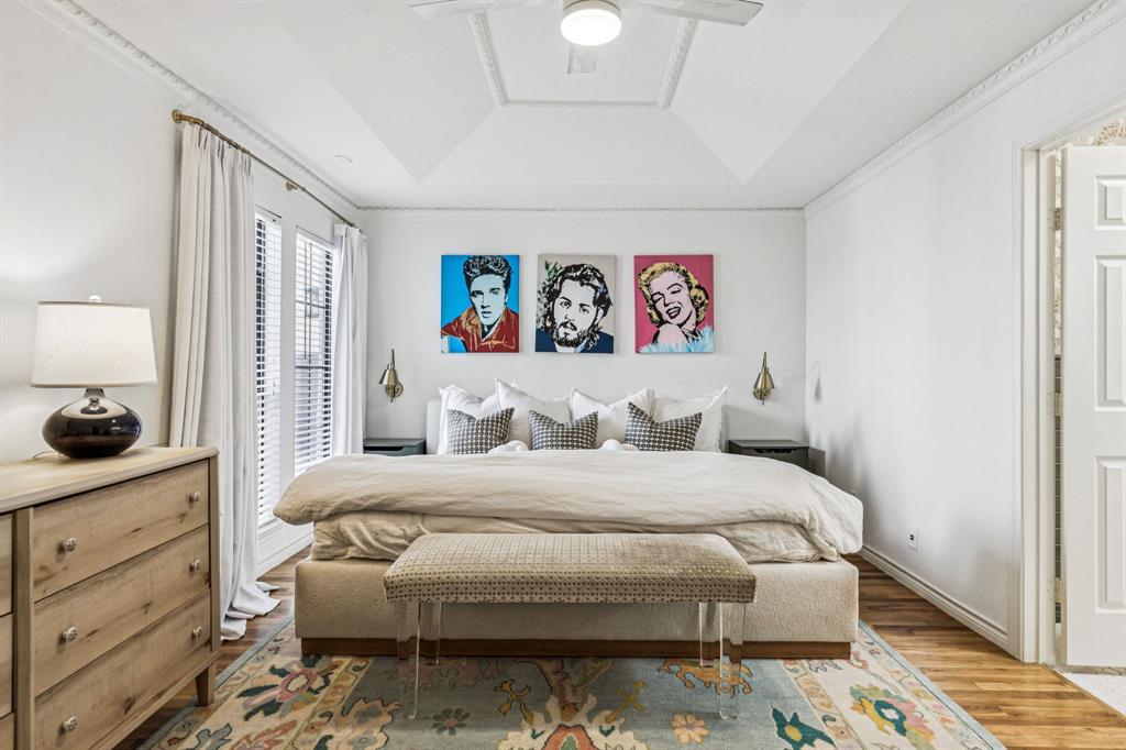 3635 Bryan Street Dallas, TX 75204 - Photo 22 of 40 a bedroom with a bed and a window