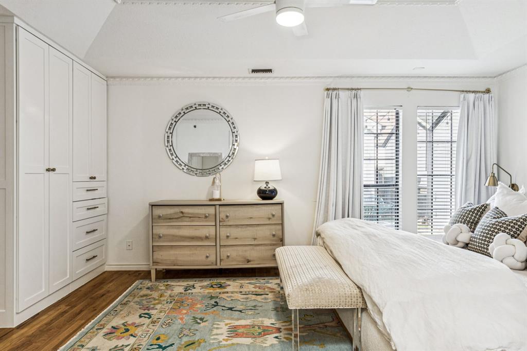 3635 Bryan Street Dallas, TX 75204 - Photo 23 of 40 a bedroom with a bed and a dresser