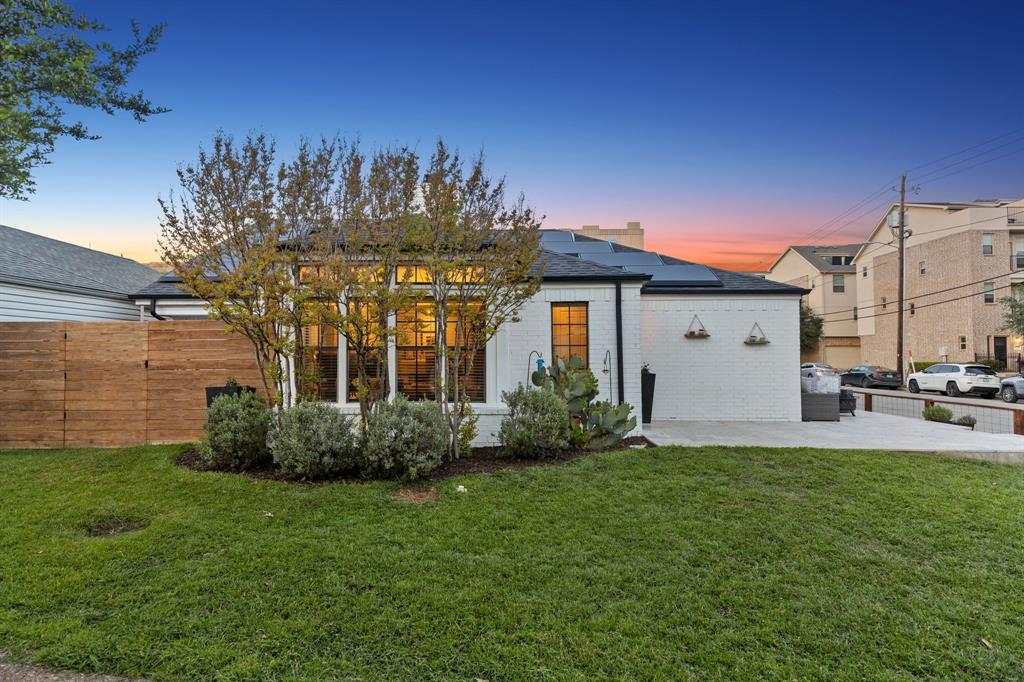 3635 Bryan Street Dallas, TX 75204 - Photo 3 of 40 a front view of a house with garden