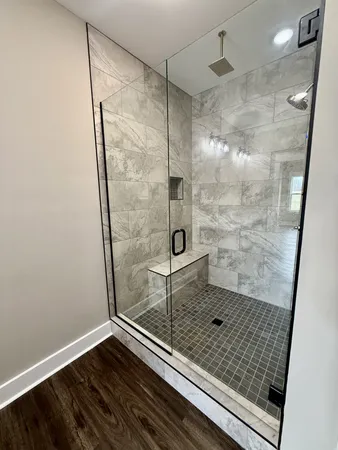 a bathroom with a double vanity sink and mirror