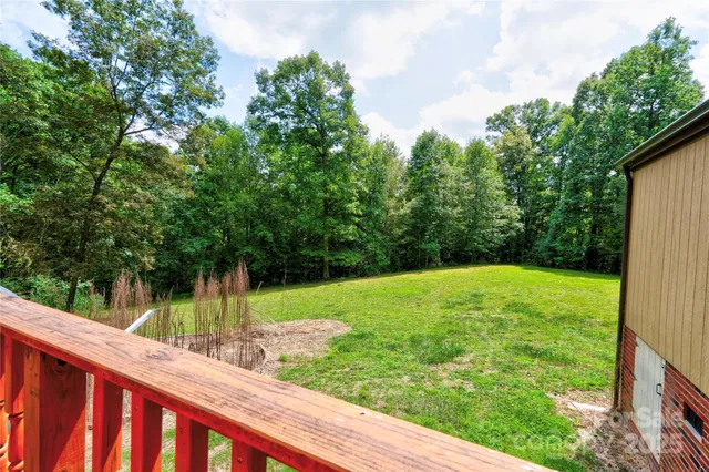 a view of a backyard with a small cabin
