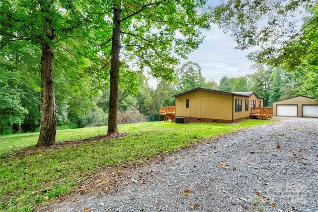 a house view with a backyard space