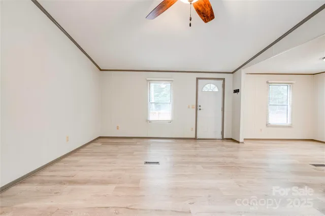 an empty room with windows