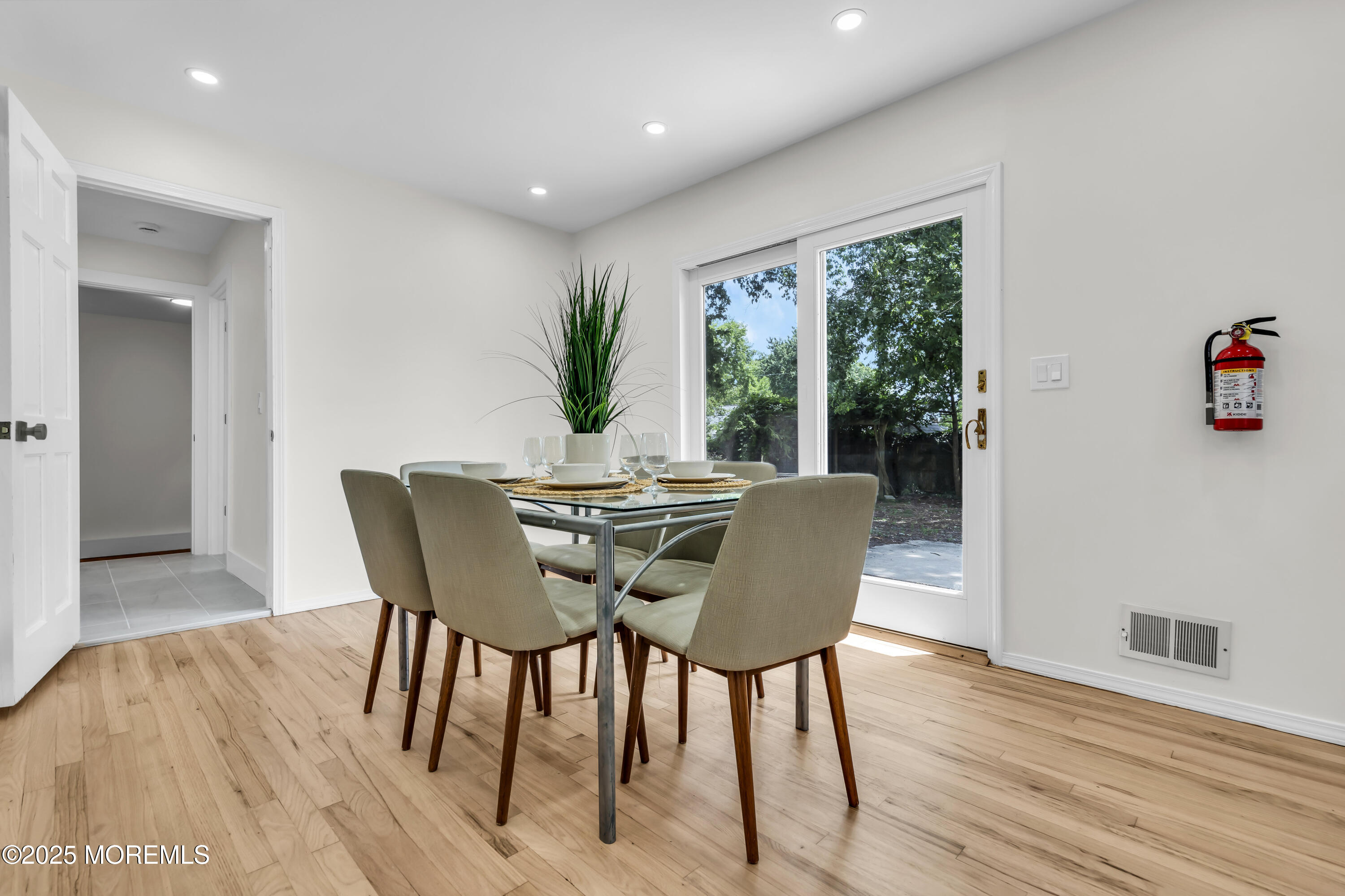 832 7th Avenue Toms River, NJ 08757 - Photo 17 of 31 a dining room with furniture window and wooden floor