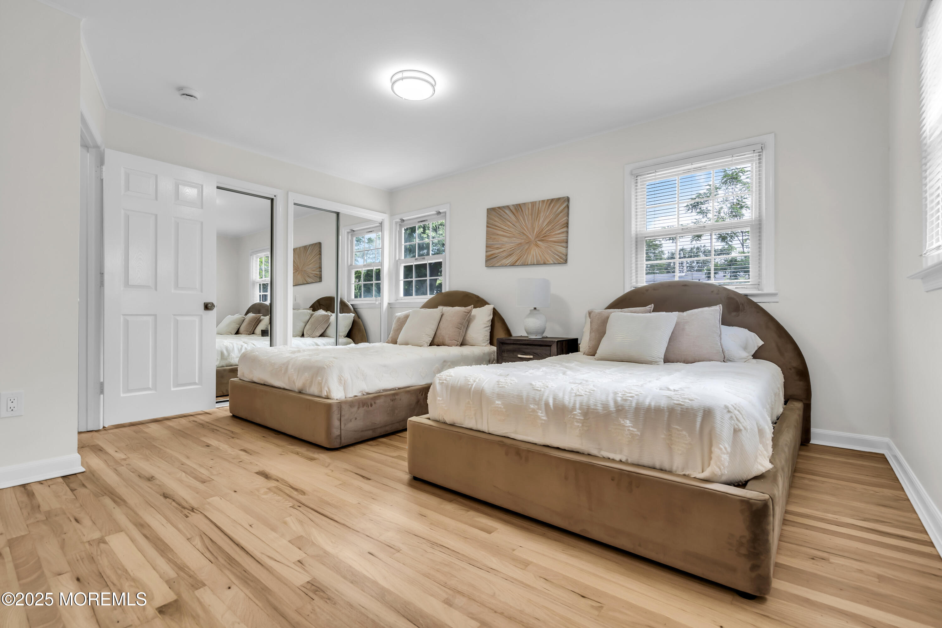 832 7th Avenue Toms River, NJ 08757 - Photo 21 of 31 a spacious bedroom with two beds and painting on the wall