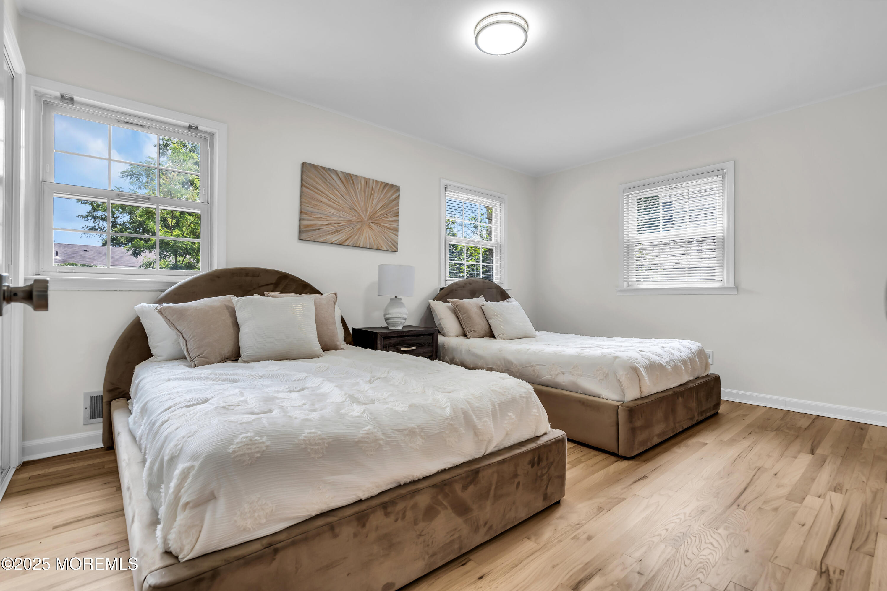 832 7th Avenue Toms River, NJ 08757 - Photo 22 of 31 a bedroom with two beds and a window