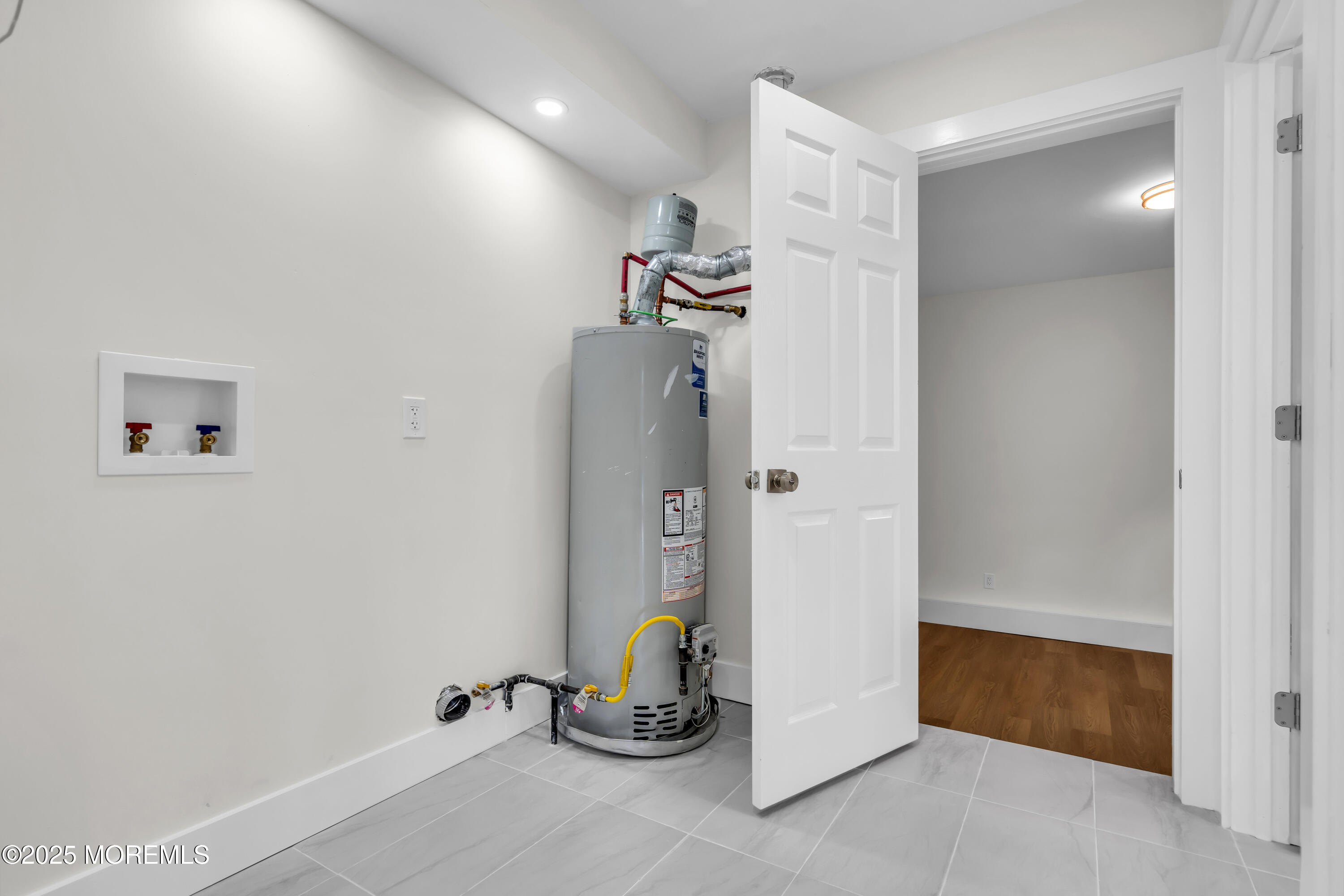 832 7th Avenue Toms River, NJ 08757 - Photo 29 of 31 a room with gym equipment and mirror