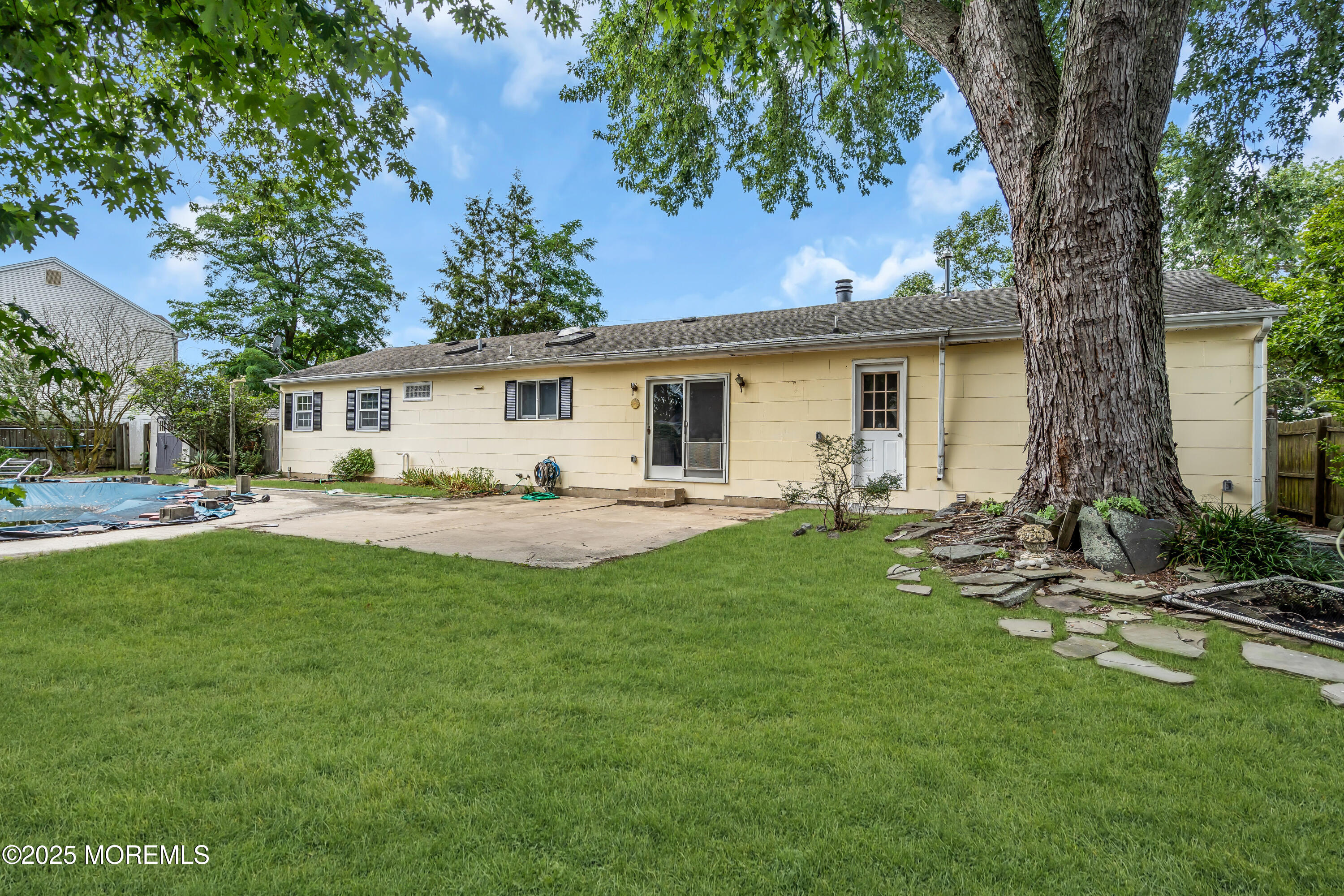832 7th Avenue Toms River, NJ 08757 - Photo 30 of 31 a front view of a house with a yard