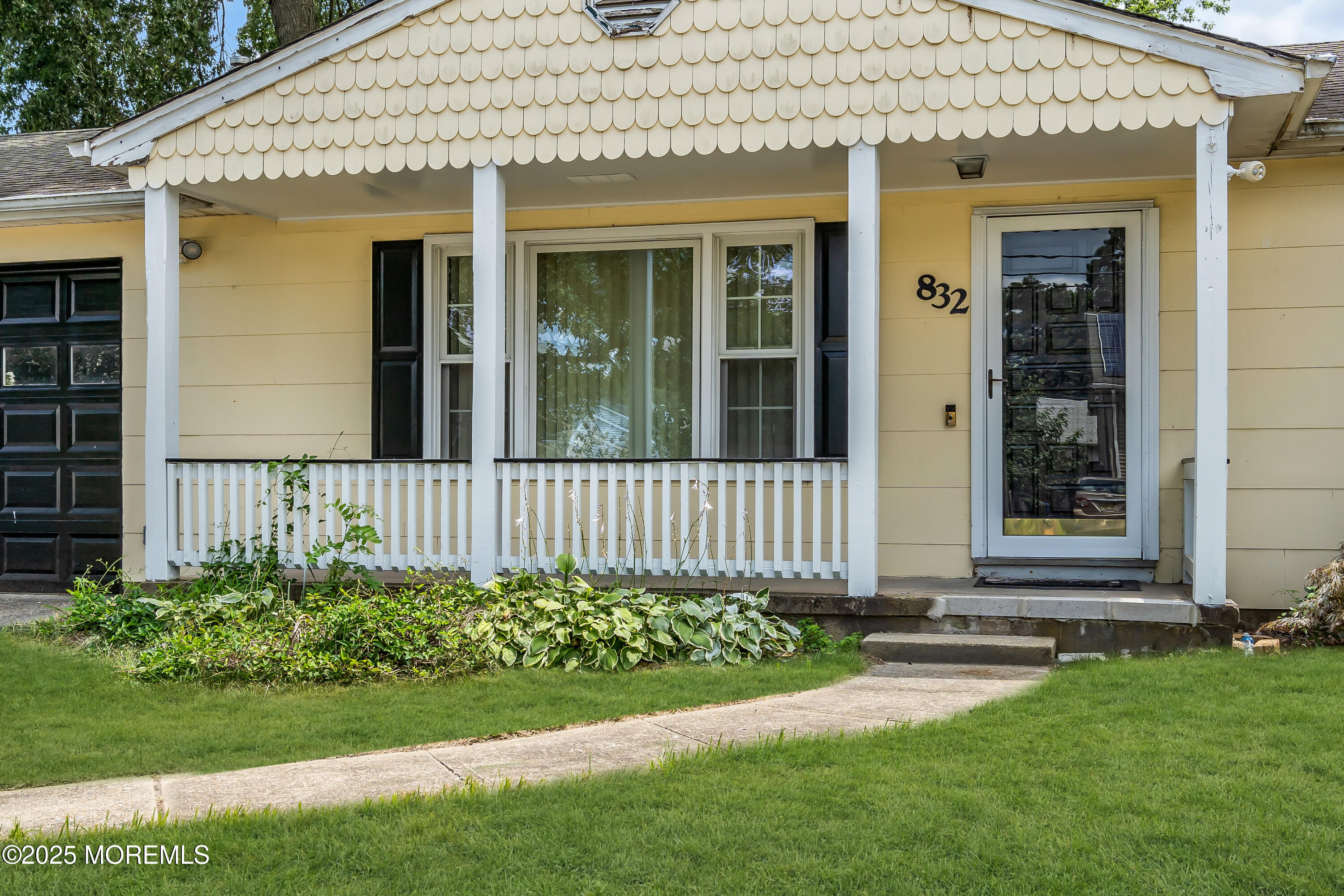 832 7th Avenue Toms River, NJ 08757 - Photo 4 of 31 front view of a house with a yard