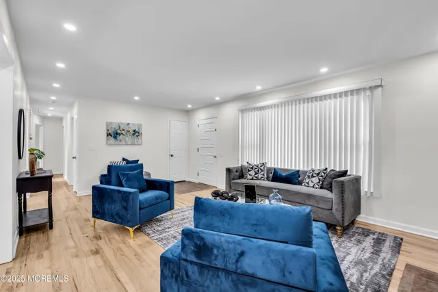 a living room with furniture and a couch