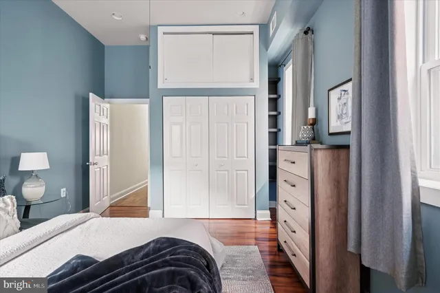 a bathroom with a sink a mirror and a toilet