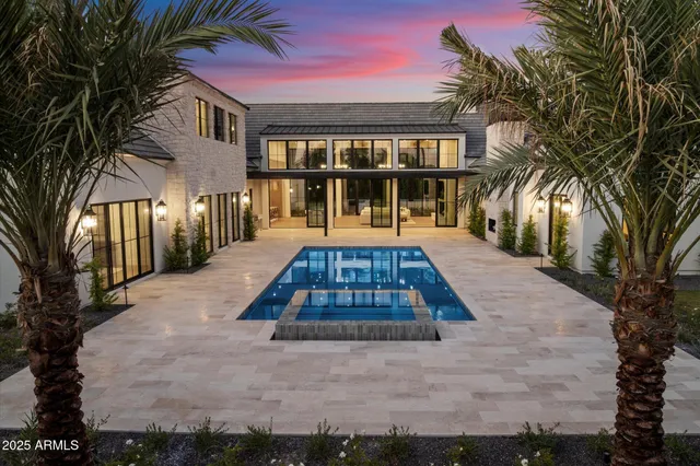 a view of swimming pool with outdoor seating