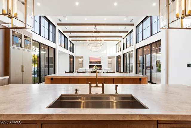 a dining table with chair and white walls