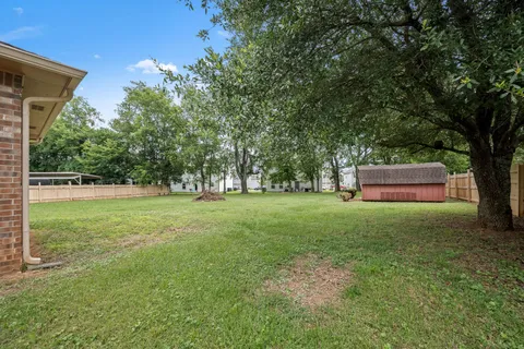 a view of a trees with a house
