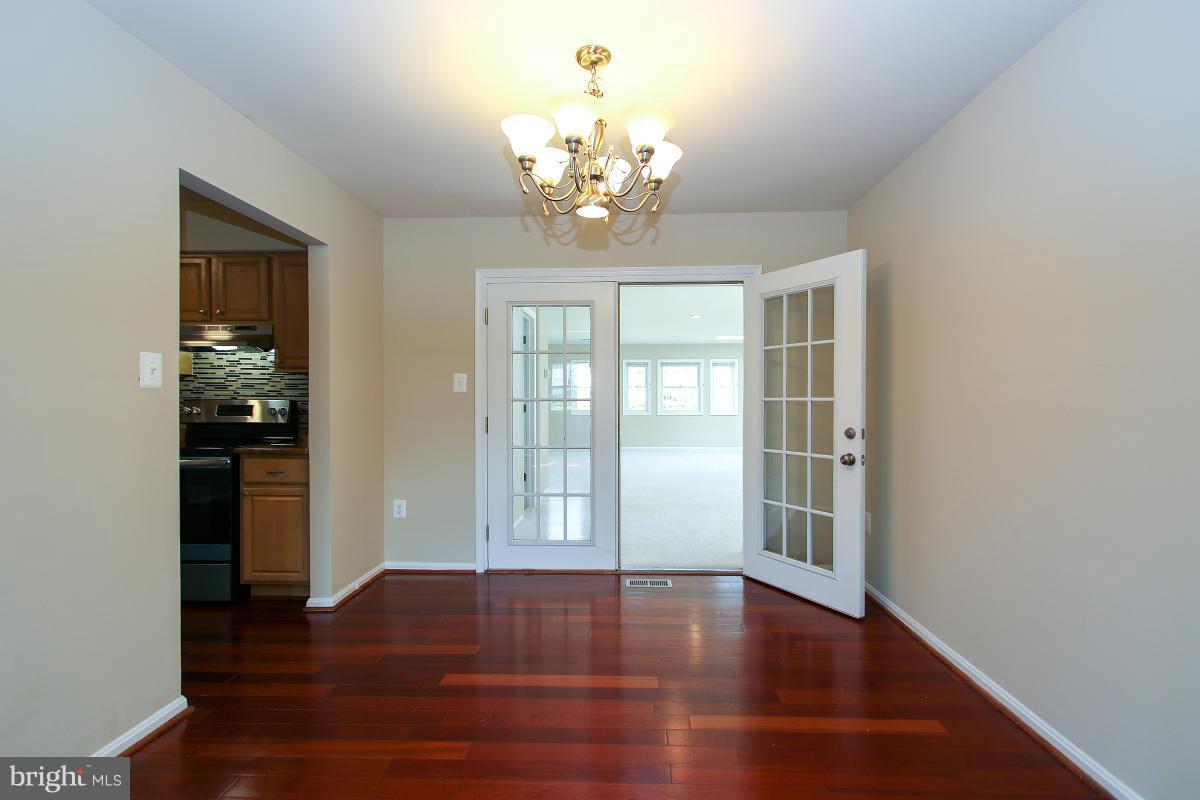 1314 Shallow Ford Road Herndon, VA 20170 - Photo 5 of 28 Dining Room opening to Addition with French Doors