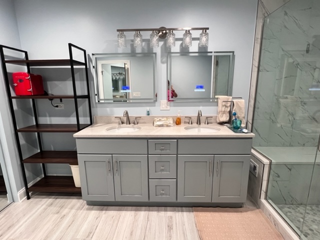 1006 North Delphia Avenue Park Ridge, IL 60068 - Photo 11 of 28 a bathroom with a sink vanity and mirror