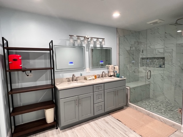 1006 North Delphia Avenue Park Ridge, IL 60068 - Photo 12 of 28 a bathroom with a sink shower and a mirror