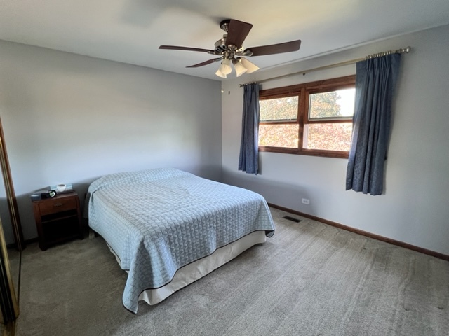 1006 North Delphia Avenue Park Ridge, IL 60068 - Photo 14 of 28 a bedroom with a bed and window