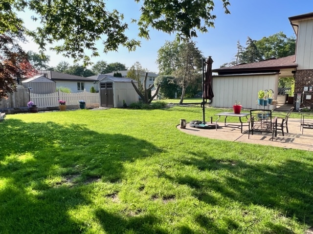 1006 North Delphia Avenue Park Ridge, IL 60068 - Photo 28 of 28 a view of a house with a backyard and a patio